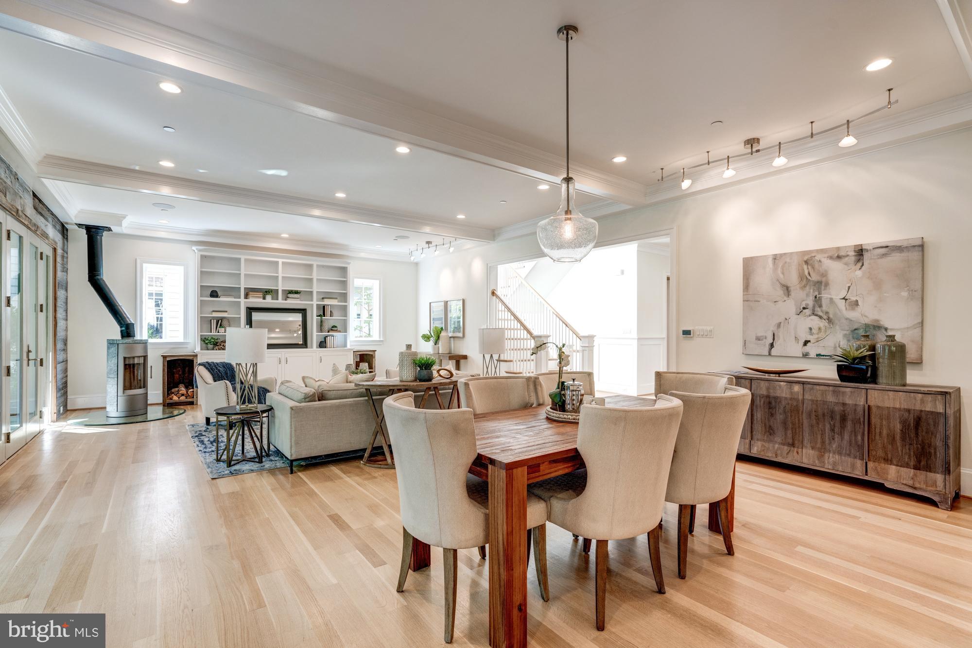 5607 Warwick Place Chevy Chase, MD 20815 - Photo 19 of 91 a view of a dining room with furniture window and wooden floor