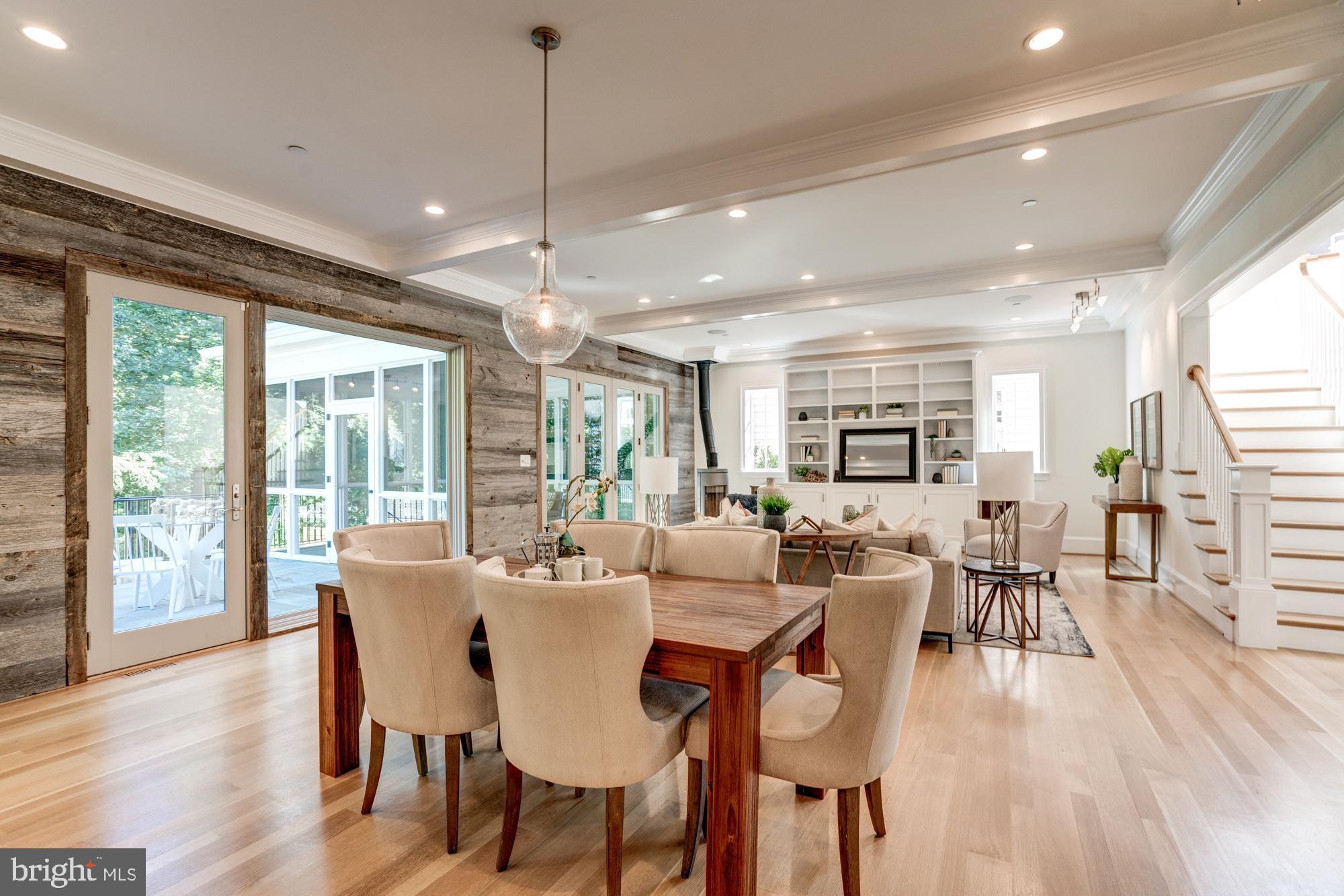 5607 Warwick Place Chevy Chase, MD 20815 - Photo 20 of 91 a view of a dining room with furniture window and wooden floor