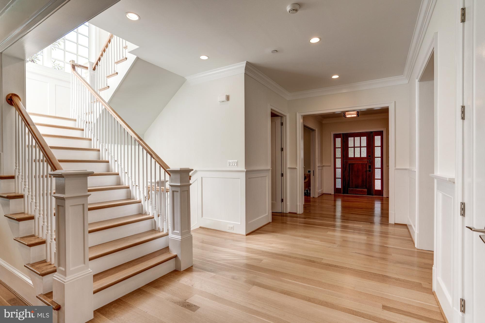 5607 Warwick Place Chevy Chase, MD 20815 - Photo 40 of 91 a view of a hallway with wooden floor and entryway