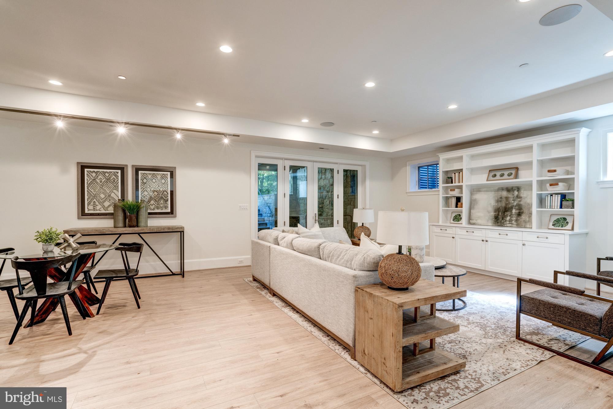 5607 Warwick Place Chevy Chase, MD 20815 - Photo 68 of 91 a living room with furniture and next to a window