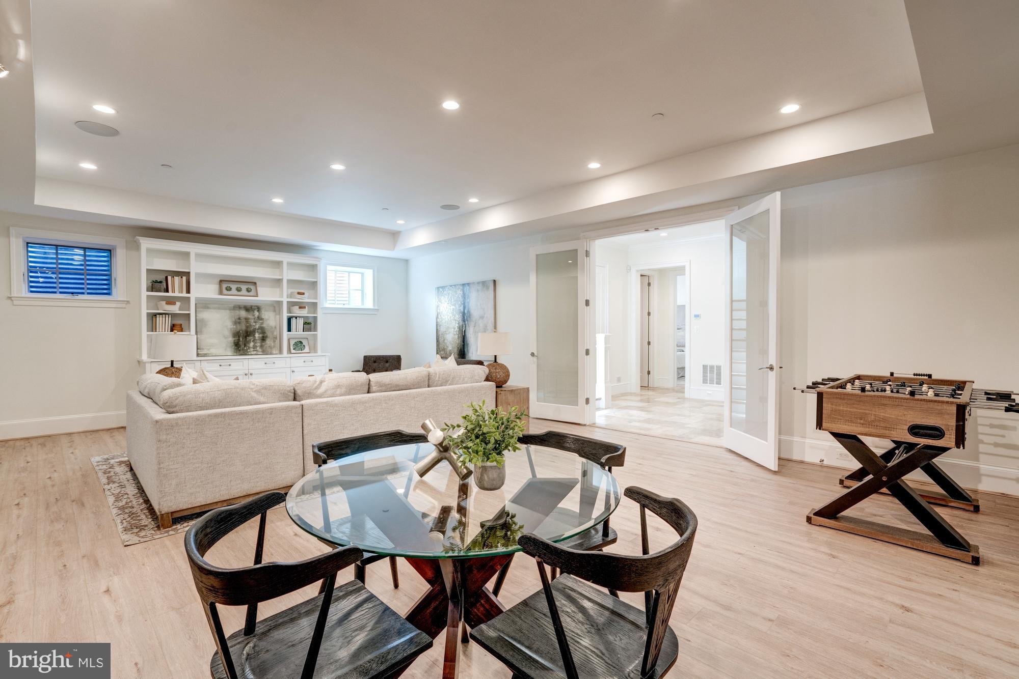 5607 Warwick Place Chevy Chase, MD 20815 - Photo 70 of 91 a view of a dining room with furniture and wooden floor