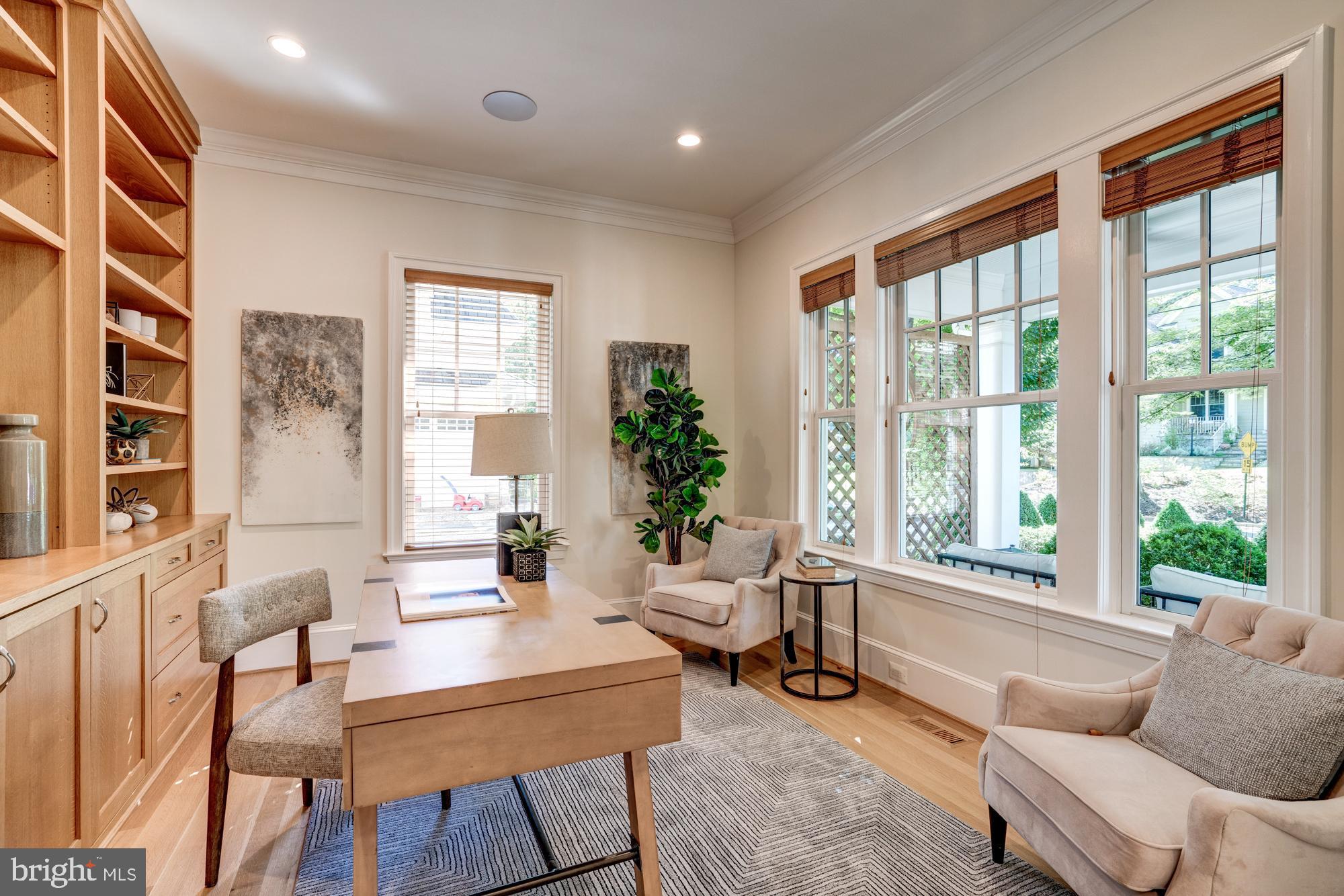 5607 Warwick Place Chevy Chase, MD 20815 - Photo 8 of 91 a living room with furniture and a large window