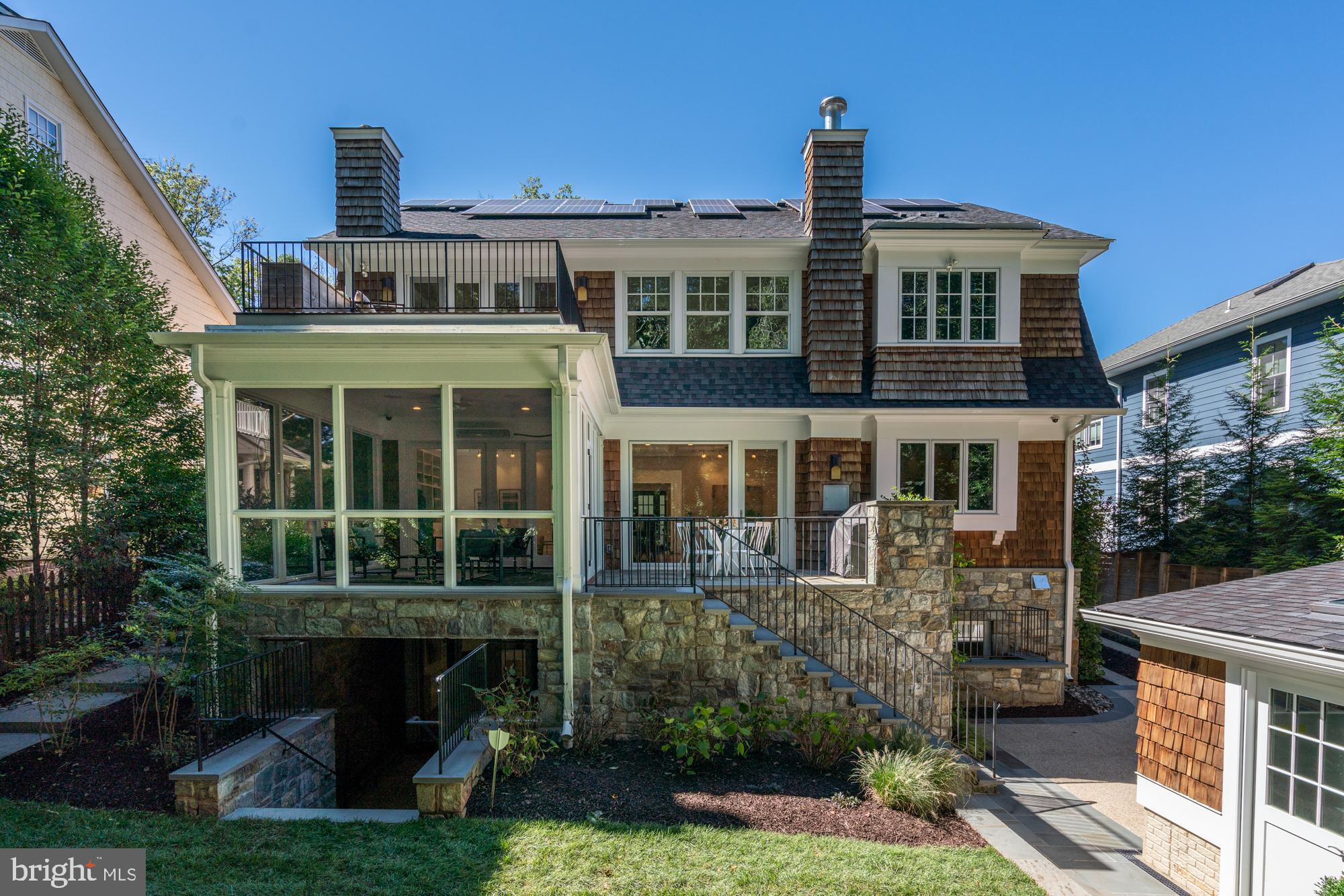 5607 Warwick Place Chevy Chase, MD 20815 - Photo 84 of 91 a front view of a house with garden