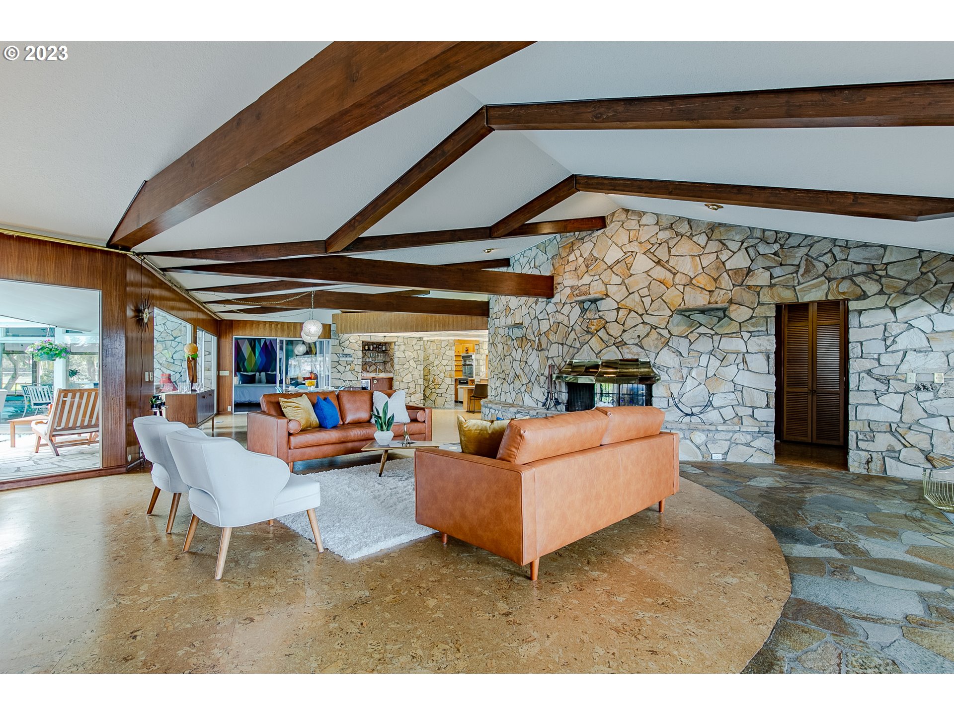 85124 Cloverdale Road Creswell, OR 97426 - Photo 12 of 48 a living room with furniture and a fireplace