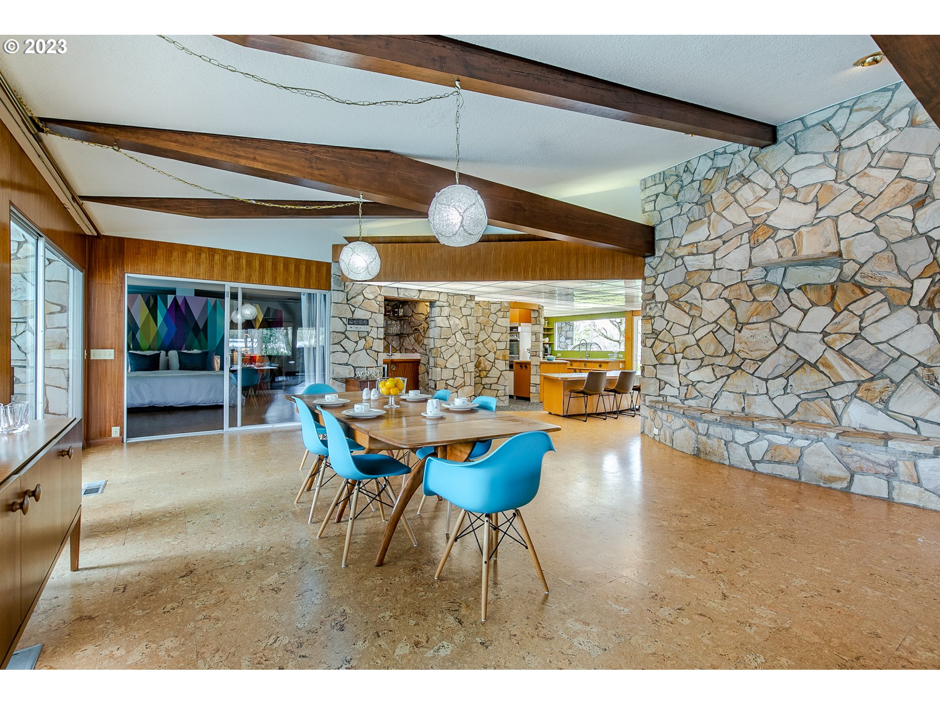 85124 Cloverdale Road Creswell, OR 97426 - Photo 13 of 48 a view of a dining room with furniture and chandelier