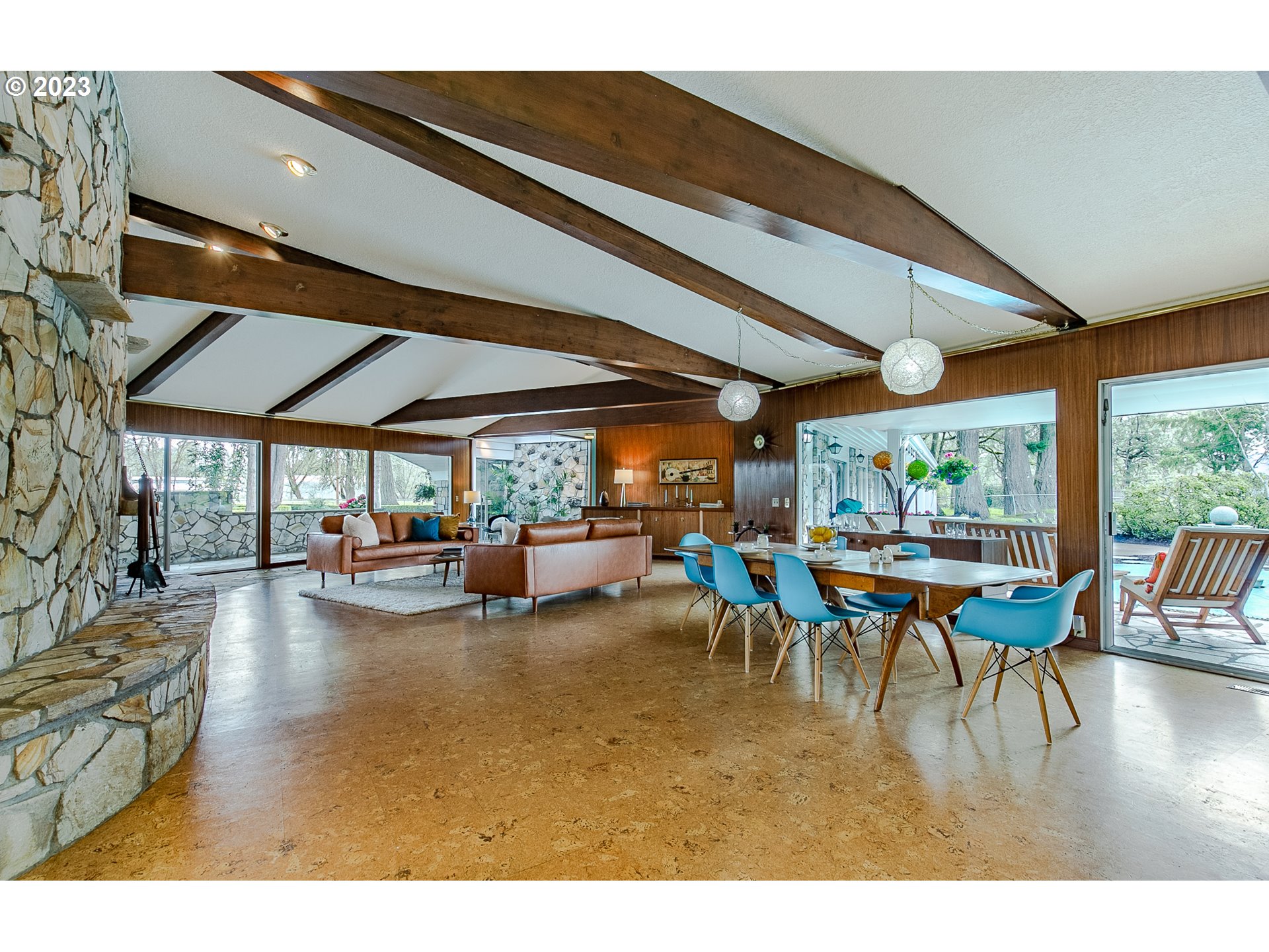 85124 Cloverdale Road Creswell, OR 97426 - Photo 15 of 48 a view of a patio with table and chairs and potted plants