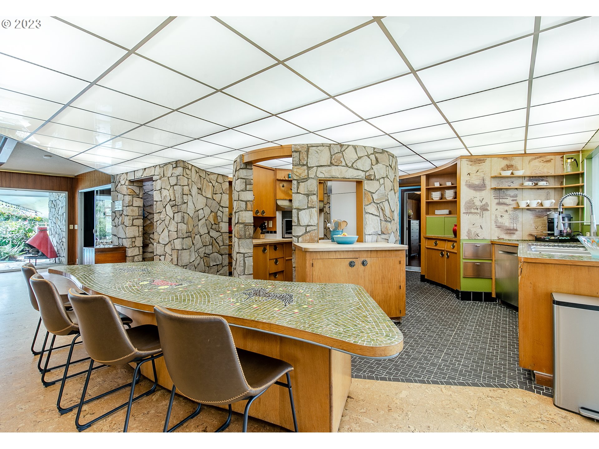 85124 Cloverdale Road Creswell, OR 97426 - Photo 17 of 48 a view of a dining room with furniture and a chandelier