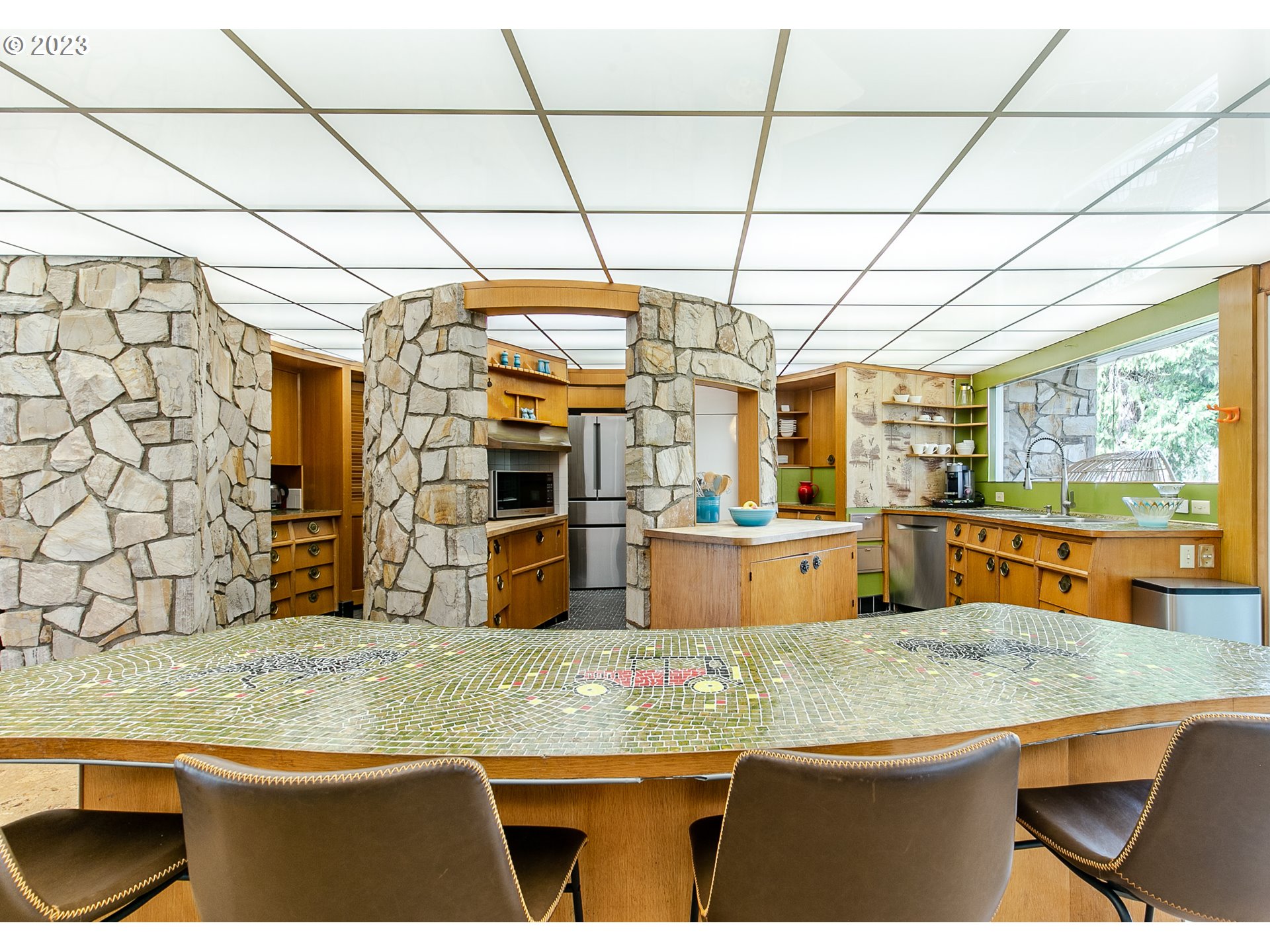 85124 Cloverdale Road Creswell, OR 97426 - Photo 18 of 48 a kitchen with stainless steel appliances granite countertop a sink window and cabinets