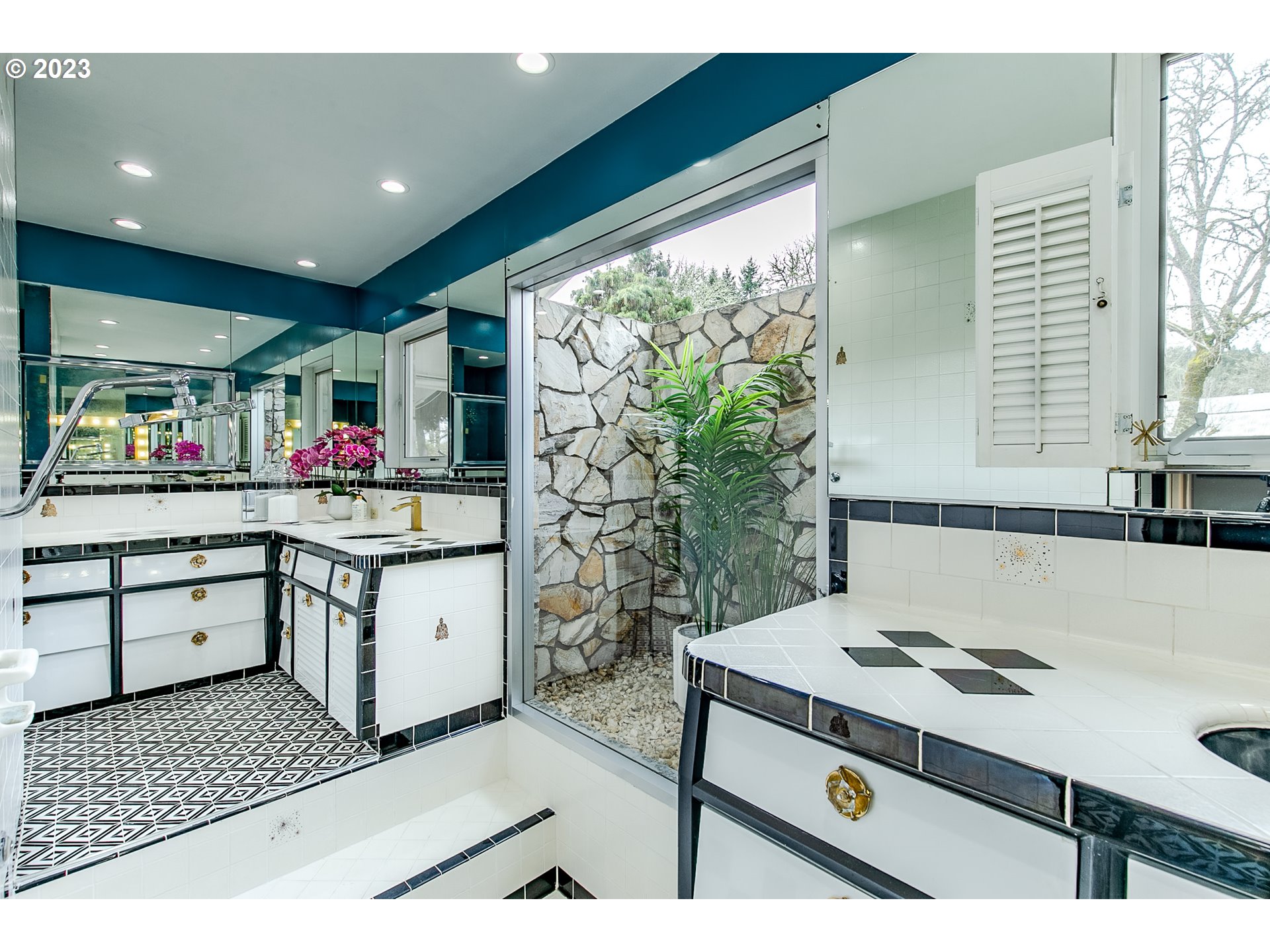 85124 Cloverdale Road Creswell, OR 97426 - Photo 25 of 48 a kitchen with a stove and white cabinets