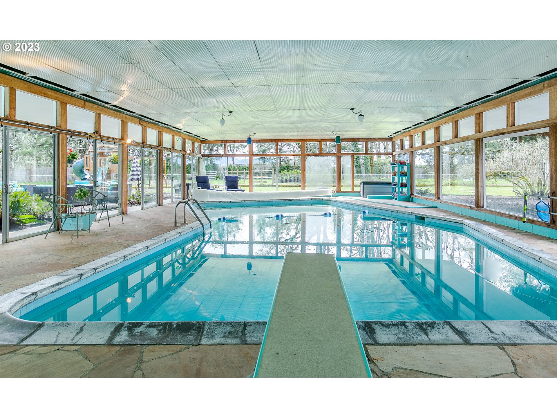 85124 Cloverdale Road Creswell, OR 97426 - Photo 35 of 48 a view of a living room and floor to ceiling room