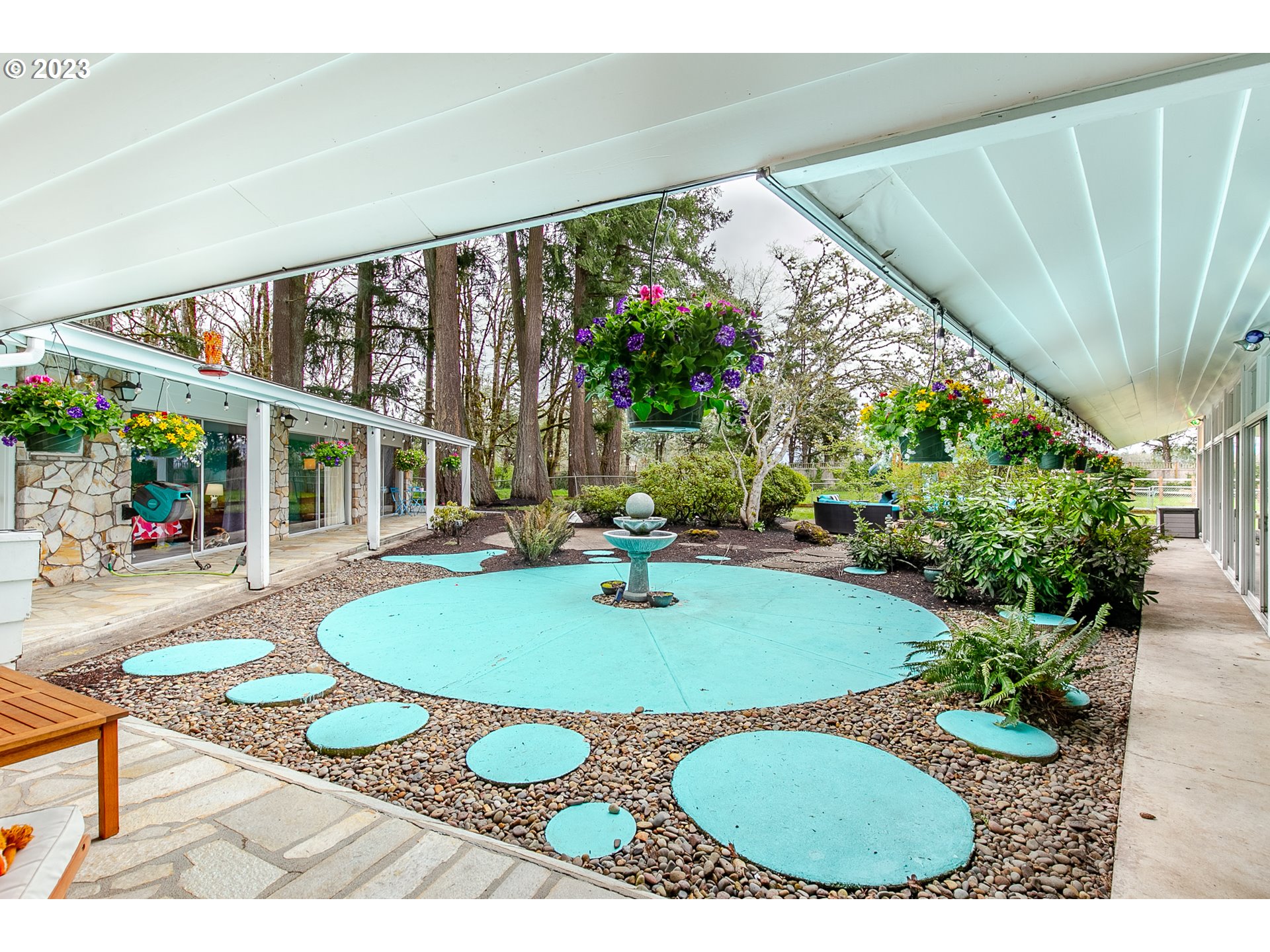 85124 Cloverdale Road Creswell, OR 97426 - Photo 40 of 48 a view of backyard with swimming pool and outdoor seating
