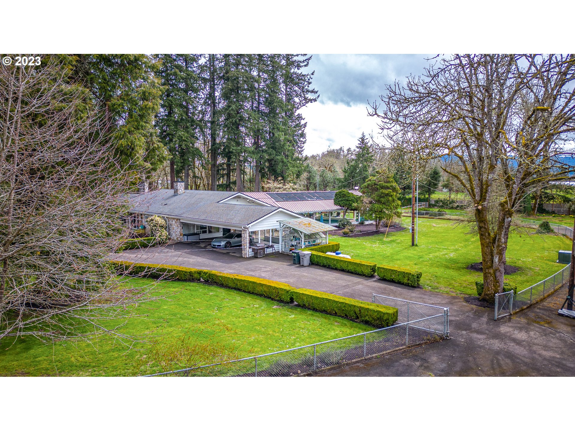 85124 Cloverdale Road Creswell, OR 97426 - Photo 47 of 48 a view of a house with a yard