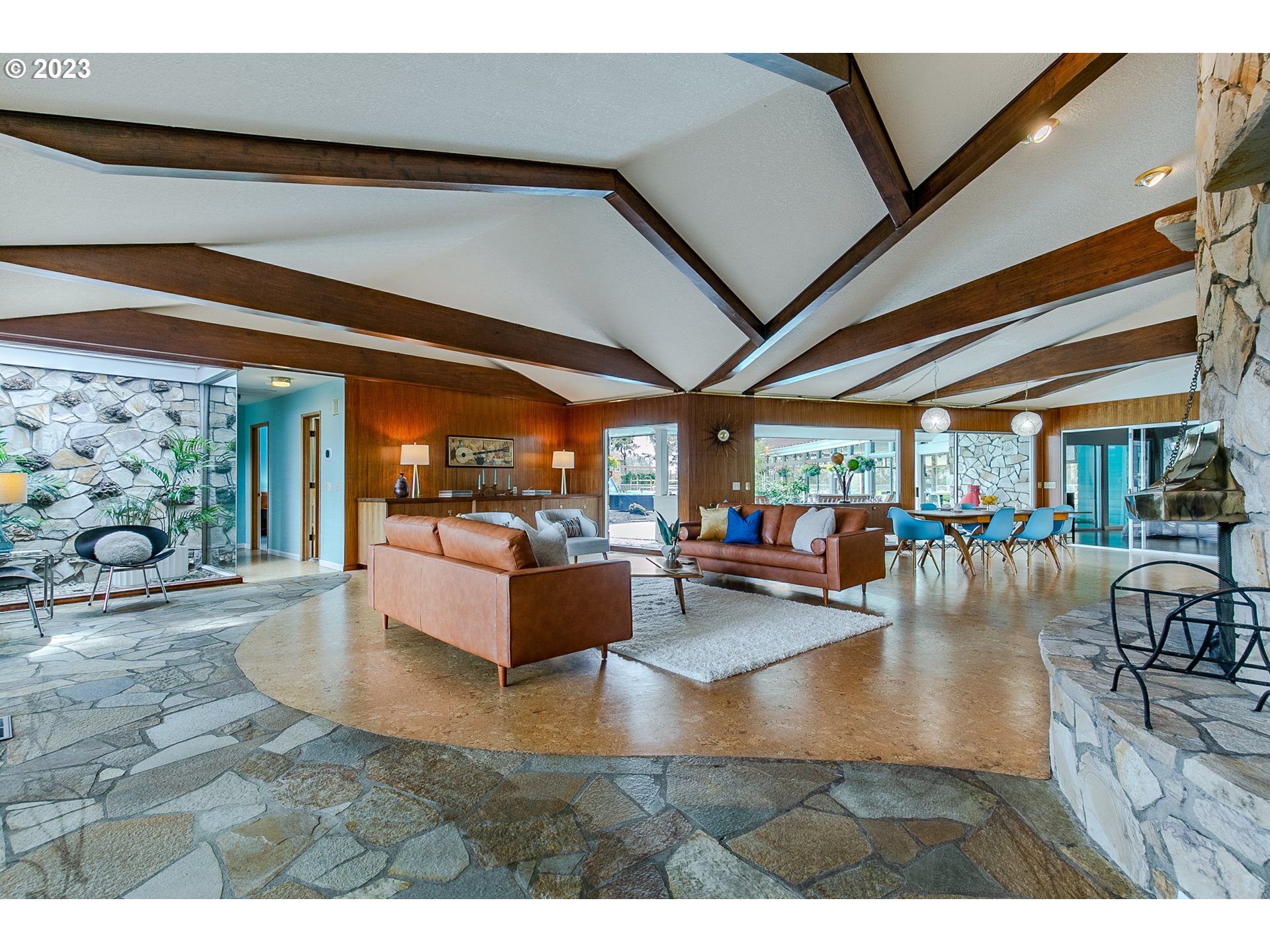 85124 Cloverdale Road Creswell, OR 97426 - Photo 9 of 48 a living room with fireplace furniture and a large window