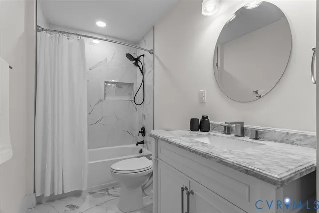 a view of bathroom with dual sinks