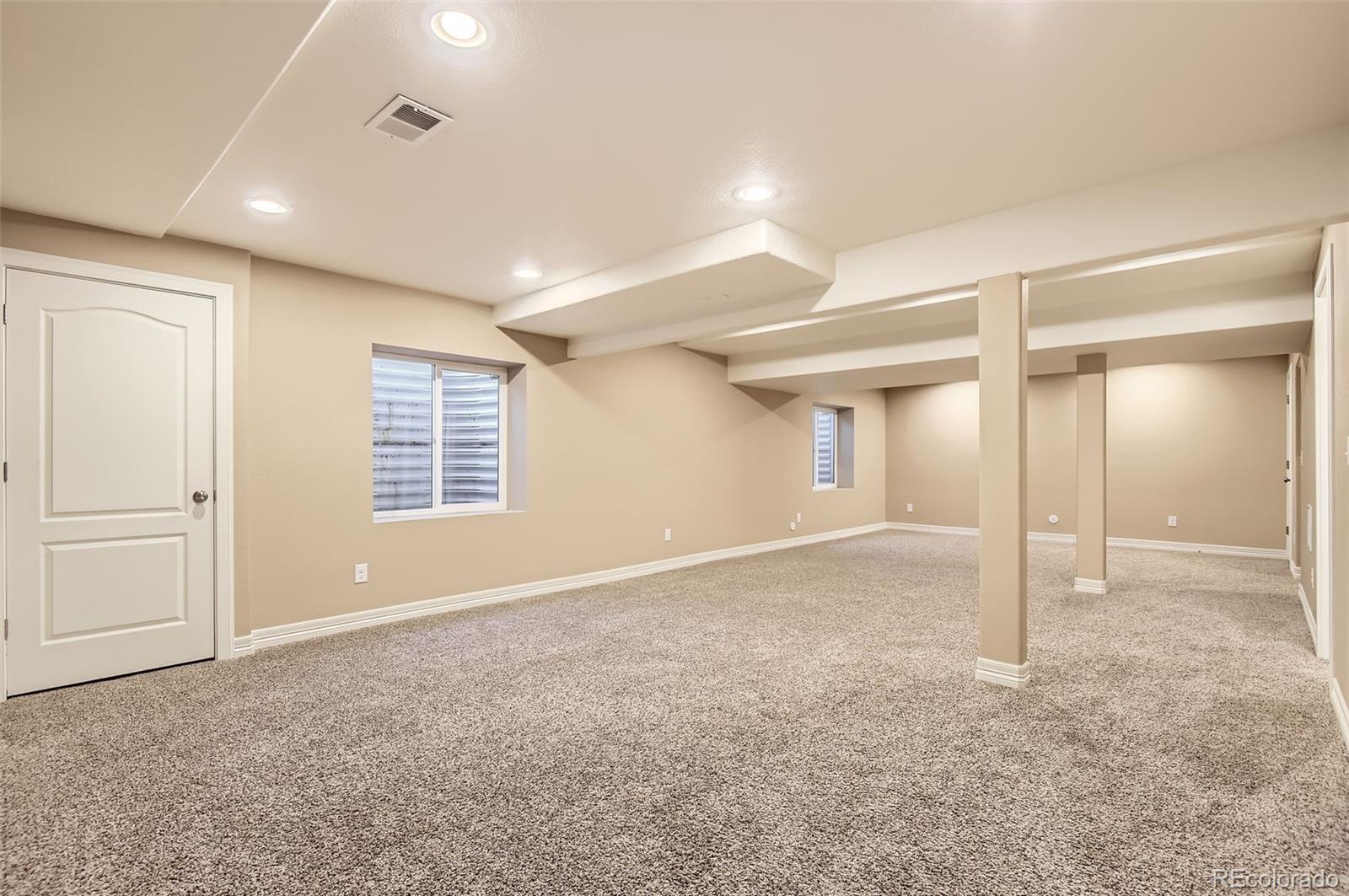14110 Greenfield Loop Parker, CO 80134 - Photo 33 of 47 a view of an empty room with a window