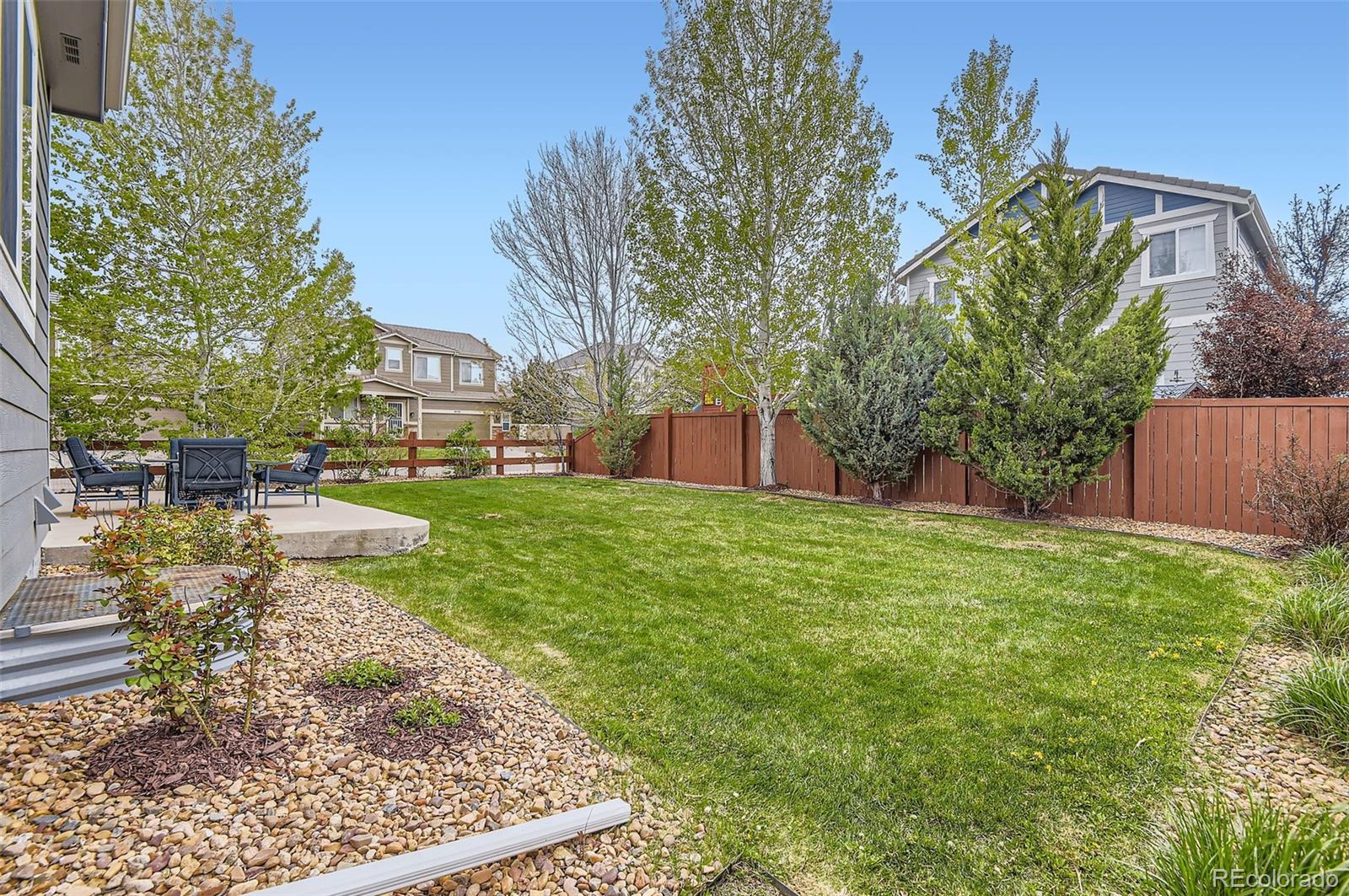 14110 Greenfield Loop Parker, CO 80134 - Photo 36 of 47 a view of a backyard with a garden