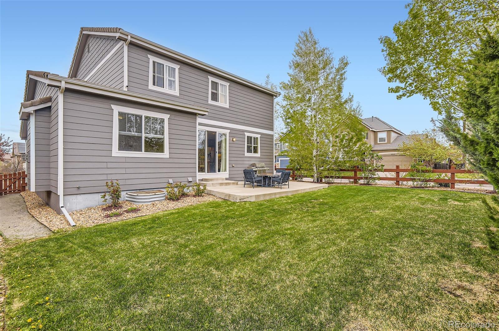 14110 Greenfield Loop Parker, CO 80134 - Photo 37 of 47 a front view of house with yard