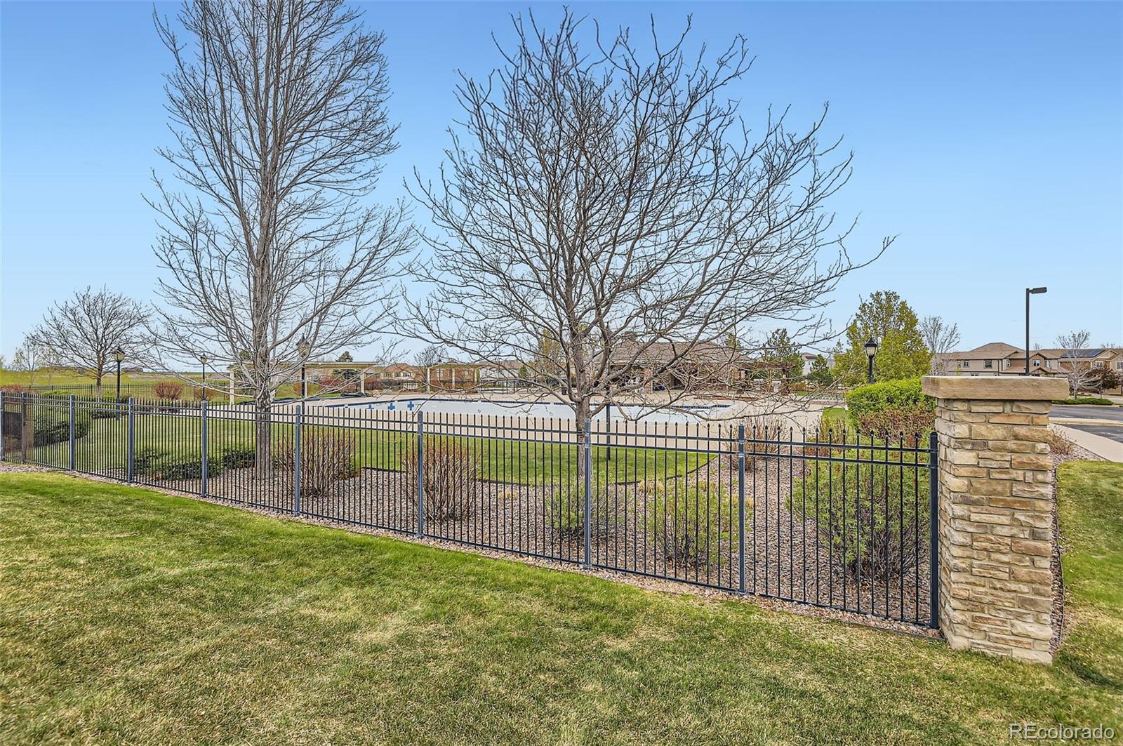 14110 Greenfield Loop Parker, CO 80134 - Photo 39 of 47 a view of lake with a yard