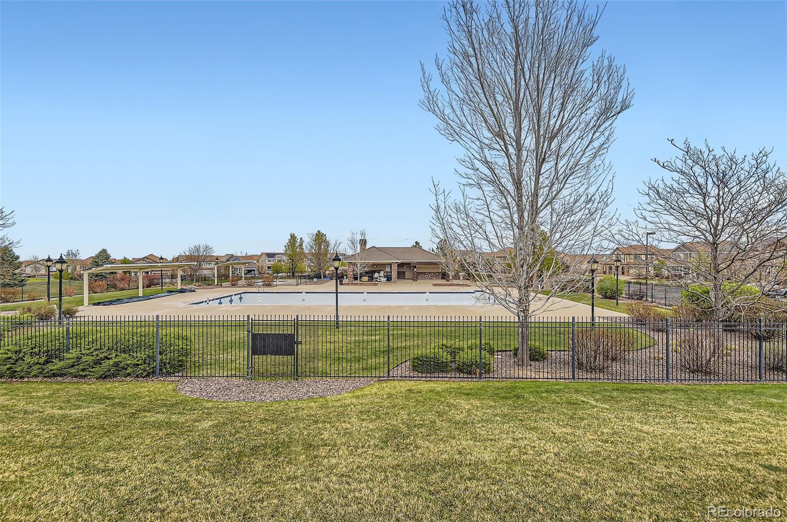 14110 Greenfield Loop Parker, CO 80134 - Photo 40 of 47 a view of a garden with a bench
