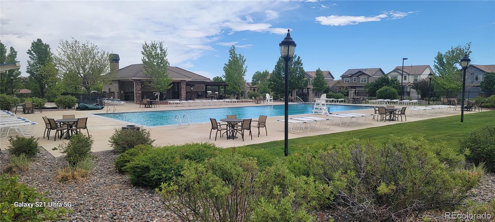14110 Greenfield Loop Parker, CO 80134 - Photo 44 of 47 a view of a park with swimming pool and sitting area