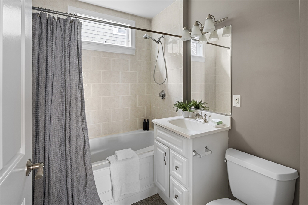 9 Cedar Street, Unit 2 Somerville, MA 02143 - Photo 14 of 20 a bathroom with a sink toilet and shower