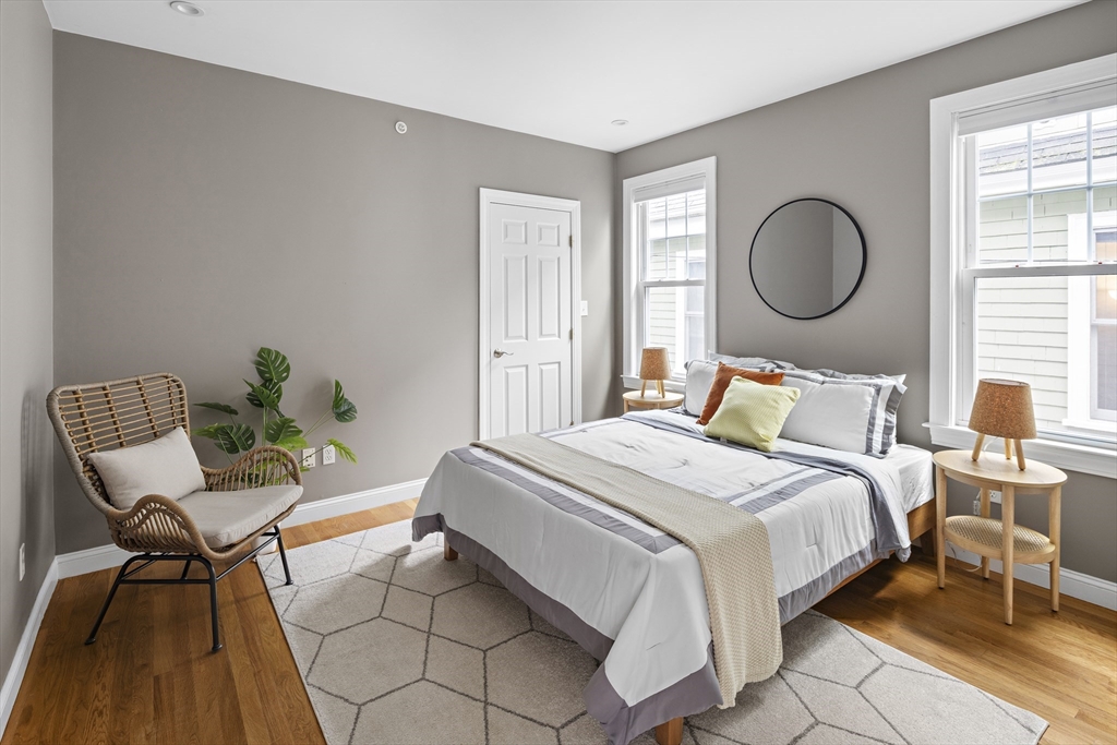 9 Cedar Street, Unit 2 Somerville, MA 02143 - Photo 15 of 20 a bedroom with bed and a window