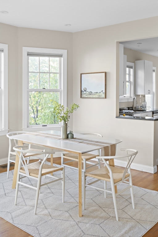 9 Cedar Street, Unit 2 Somerville, MA 02143 - Photo 7 of 20 a view of a dining room with furniture and window