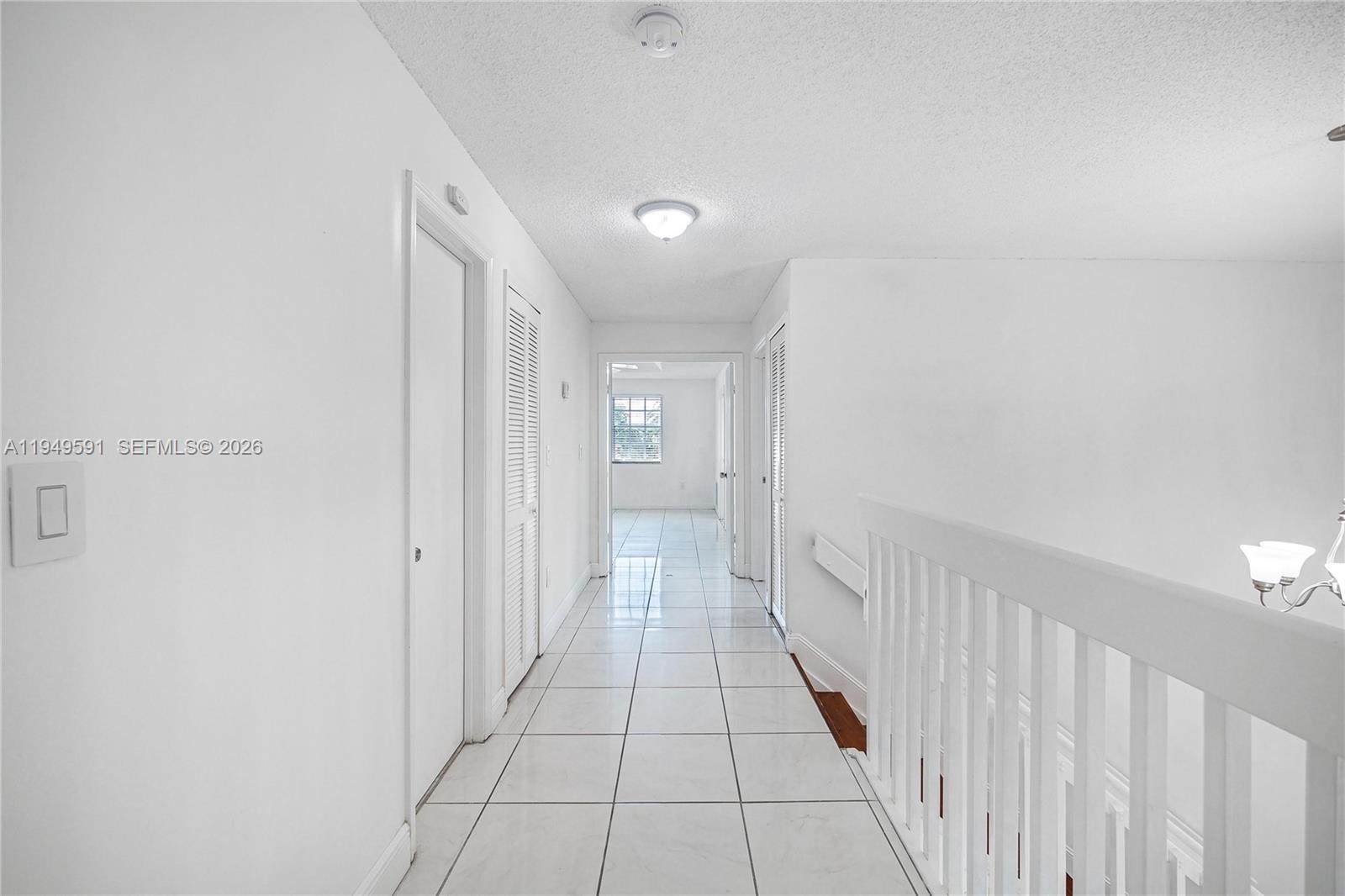 14340 Southwest 90th Street Miami, FL 33186 - Photo 22 of 34 a view of a hallway