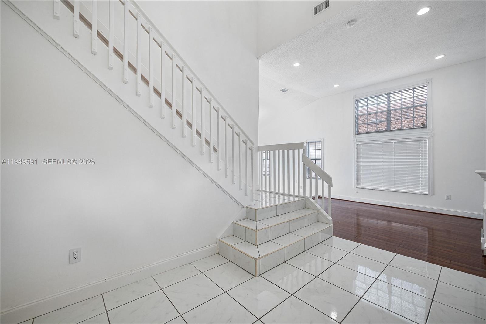 14340 Southwest 90th Street Miami, FL 33186 - Photo 30 of 34 a view of entryway and hall with a window