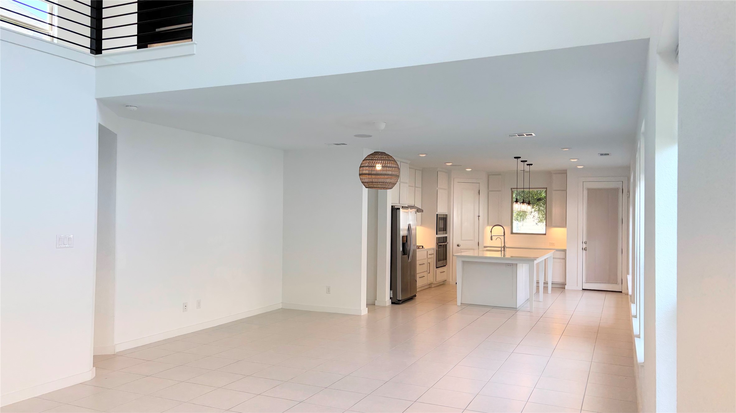 Spacious open concept dining area filled with natural light and an inviting, elevated ambiance. Designed to bring everyone together, this seamless layout creates a warm and meaningful space for gathering and connection. Pre wired for an entertainment setup and thoughtfully designed with flexibility in mind, it easily adapts to a variety of lifestyles—perfect for hosting, everyday dining, or creating a space that fits your family’s unique needs.