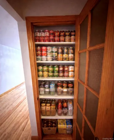 a shelf with books and knick knacks on it