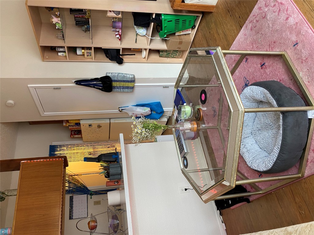 1905 San Gabriel Street, Unit 103 Austin, TX 78705 - Photo 13 of 21 a room with table and chairs