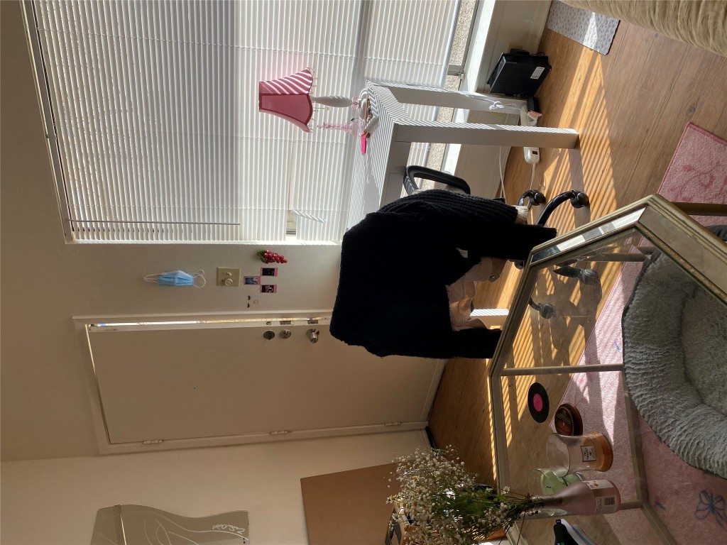 1905 San Gabriel Street, Unit 103 Austin, TX 78705 - Photo 15 of 21 a room with furniture and a potted plant