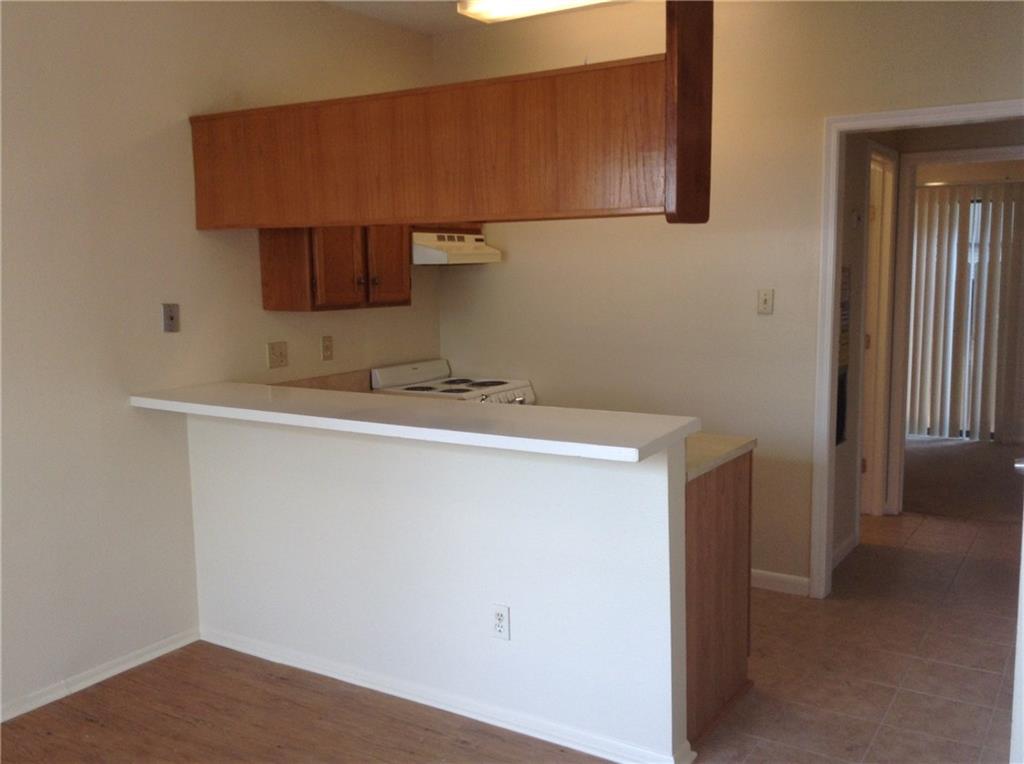 1905 San Gabriel Street, Unit 103 Austin, TX 78705 - Photo 4 of 21 a bathroom with a sink and a mirror