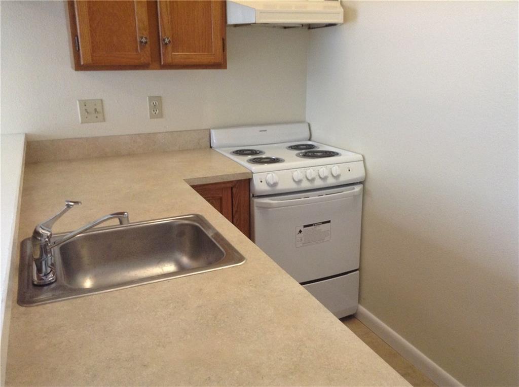 1905 San Gabriel Street, Unit 103 Austin, TX 78705 - Photo 5 of 21 a utility room with dryer and washer
