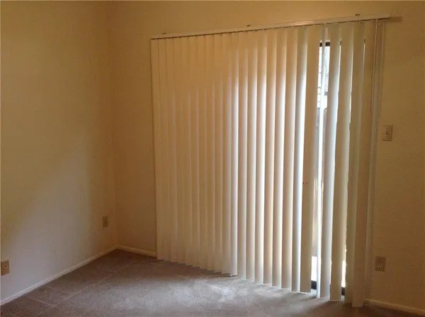 a room with table and chairs