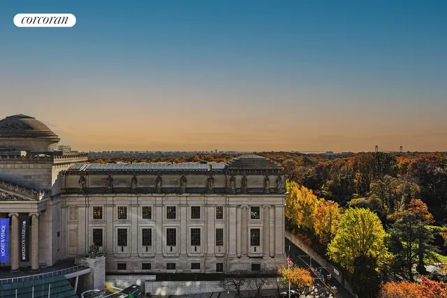 a bedroom with bed and wooden floor