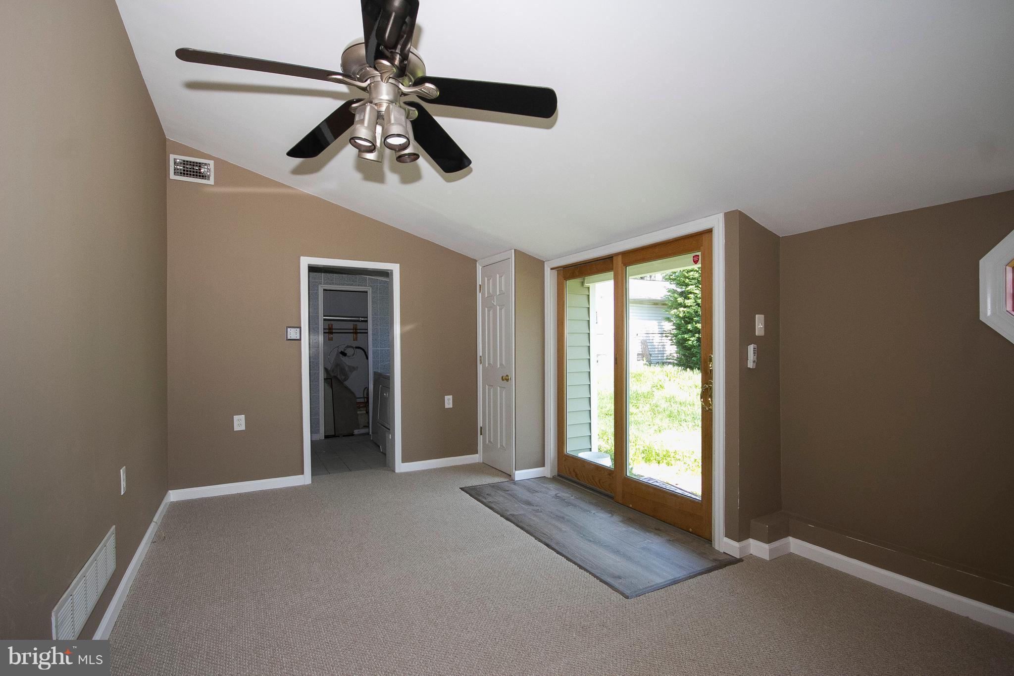 1713 Brookview Road Dundalk, MD 21222 - Photo 14 of 21 a view of empty room with window