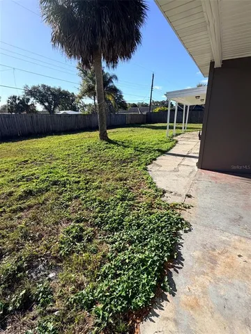 a view of swimming pool with a garden