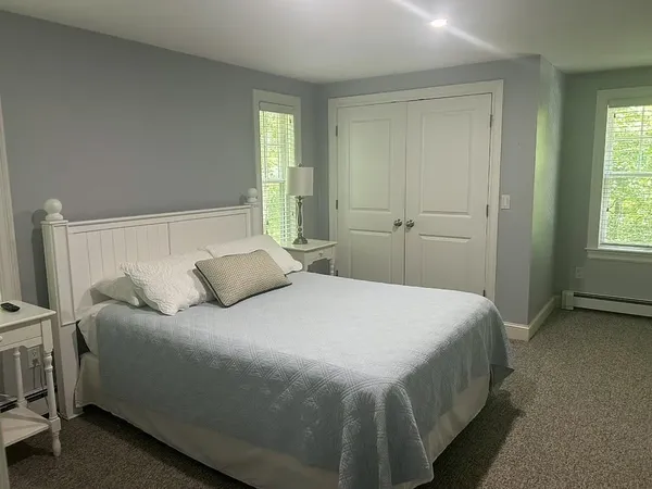a living room with a flat screen tv