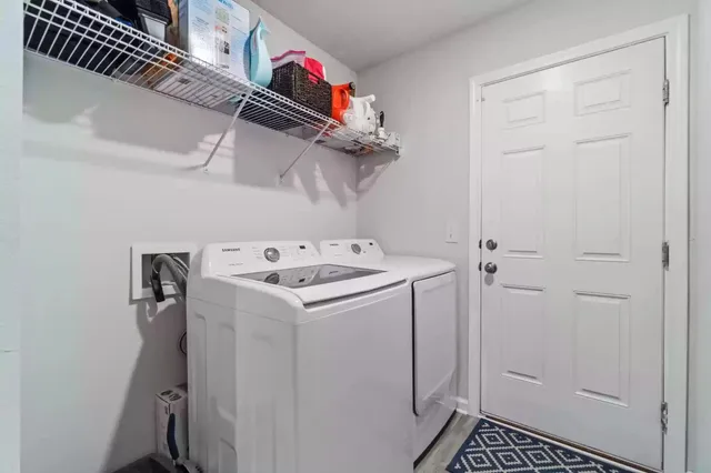 a utility room with dryer and washer