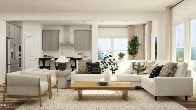 a kitchen with kitchen island a sink stainless steel appliances and cabinets
