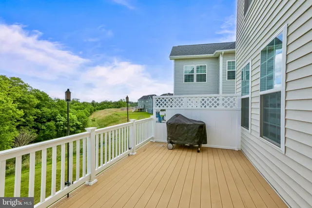 a view of a couches on the roof deck