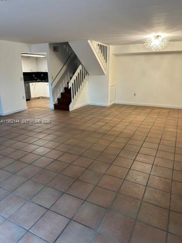 9001 Southwest 94th Street Miami, FL 33176 - Photo 5 of 23 a view of an empty room and stairs