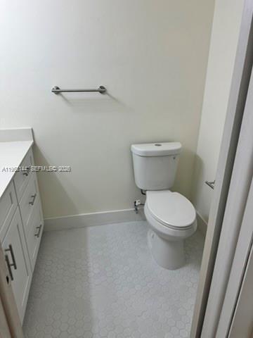 9001 Southwest 94th Street Miami, FL 33176 - Photo 7 of 23 a white toilet sitting next to a white cabinet