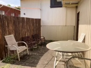 a refrigerator freezer sitting inside of a kitchen