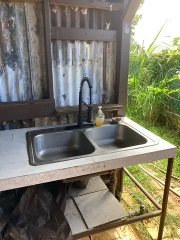 a house view with a backyard space