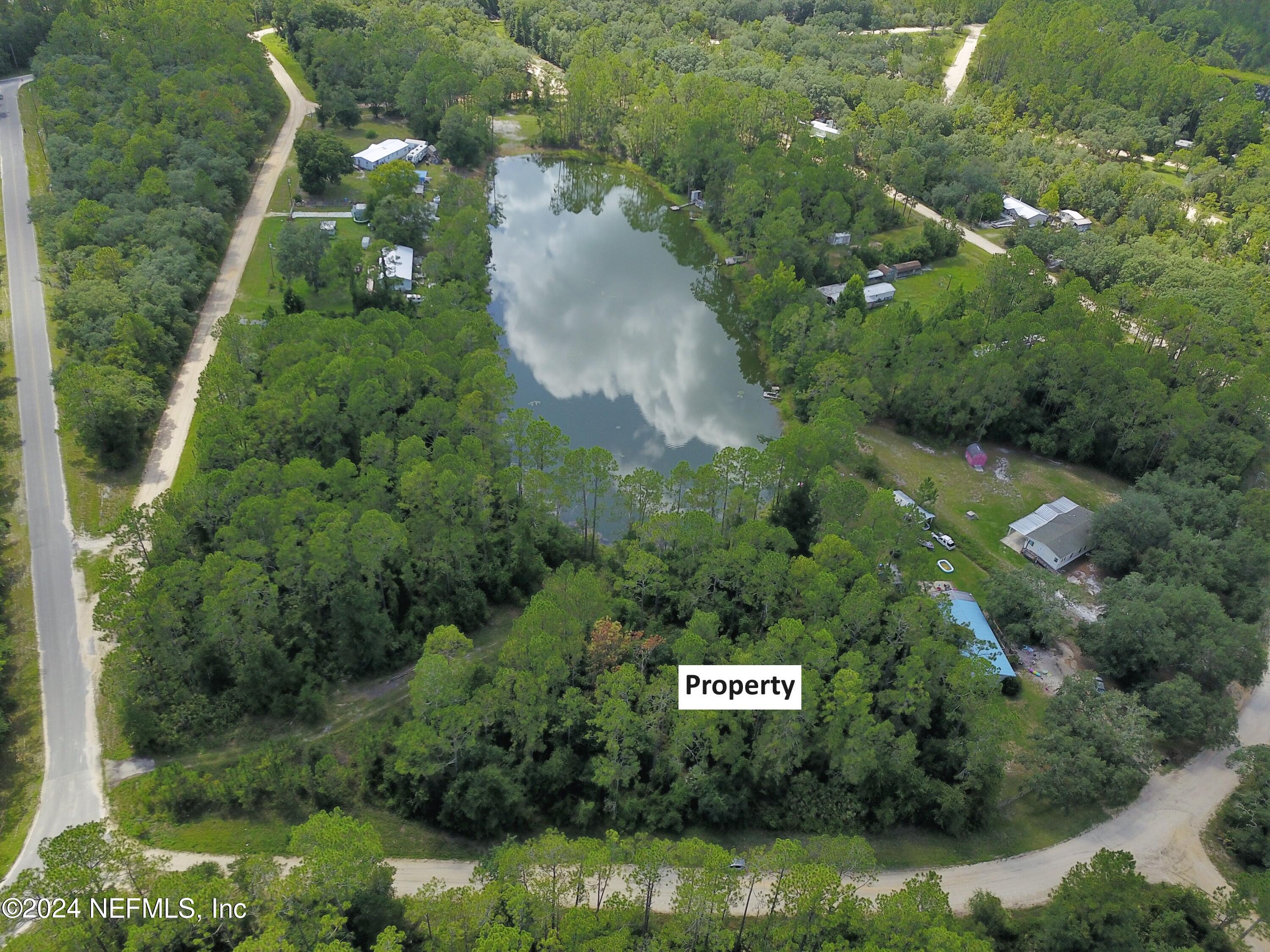 0 Boles Avenue Interlachen, FL 32148 - Photo 2 of 10 an aerial view of a residential houses with outdoor space and street view