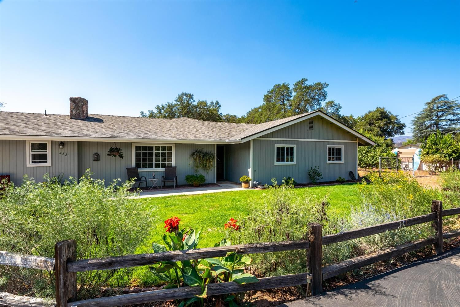 488 South Rice Road Ojai, CA 93023 - Photo 2 of 23 front view of a house with a yard