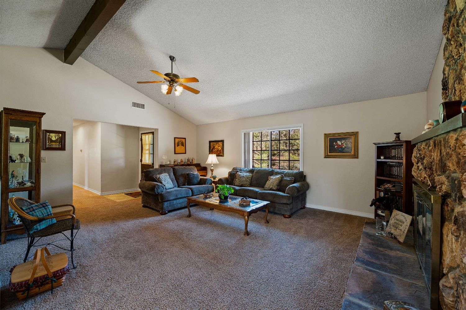 488 South Rice Road Ojai, CA 93023 - Photo 3 of 23 a living room with furniture gym equipment and a flat screen tv